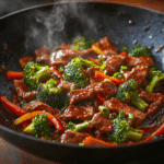 Beef stir fry recipe in wok with colorful vegetables