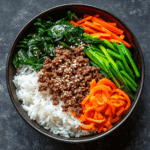 Korean rice bowl recipe with seasoned beef and vegetables